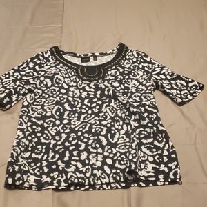Black and white tunic jeweled neckline